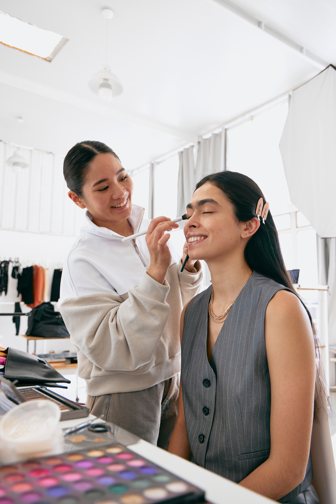 Makeup Artist Applying Makeup to a Model